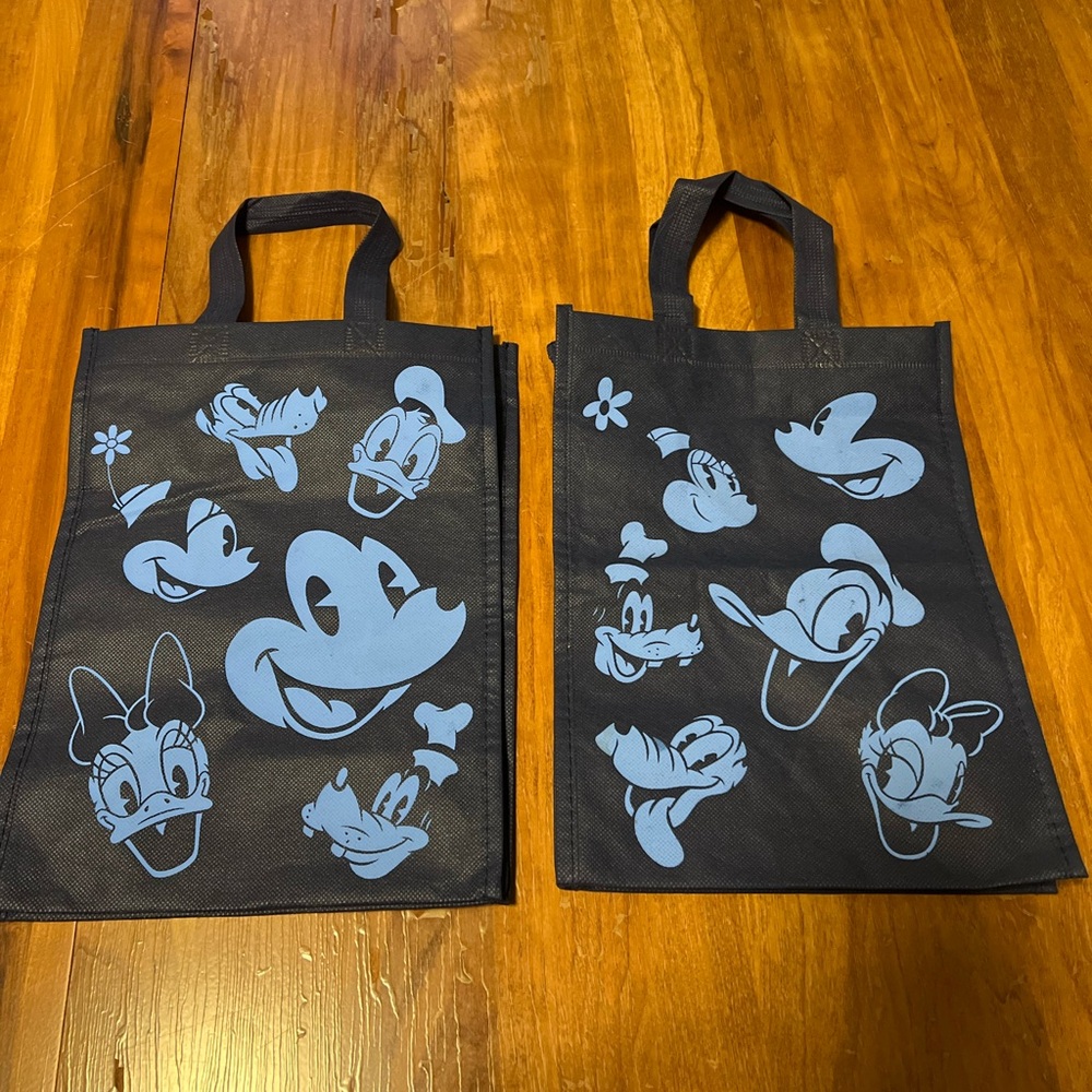 Two Disney store bags